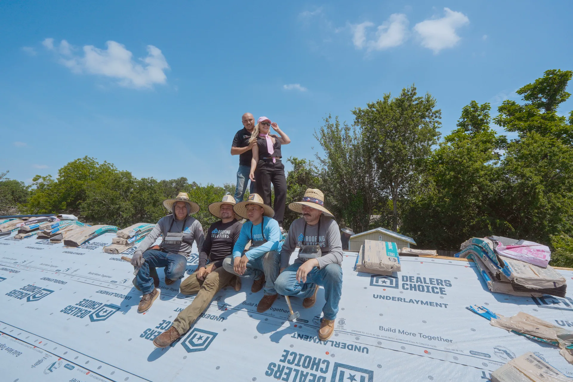 JD Roofing Solutions team on a completed roof job